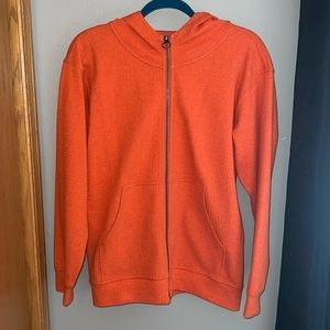 Orange Women’s Lululemon zip hoodie